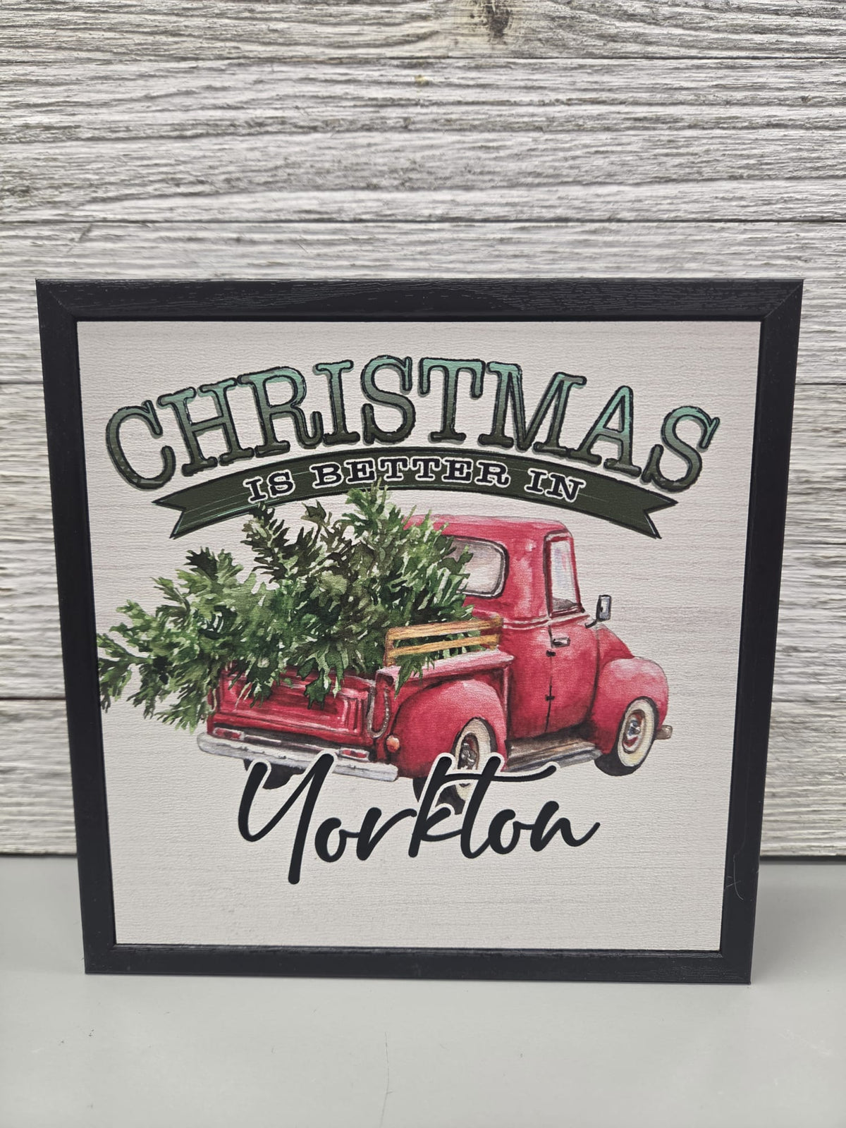 "Christmas is Better in Yorkton" Red Truck Framed Wall Sign